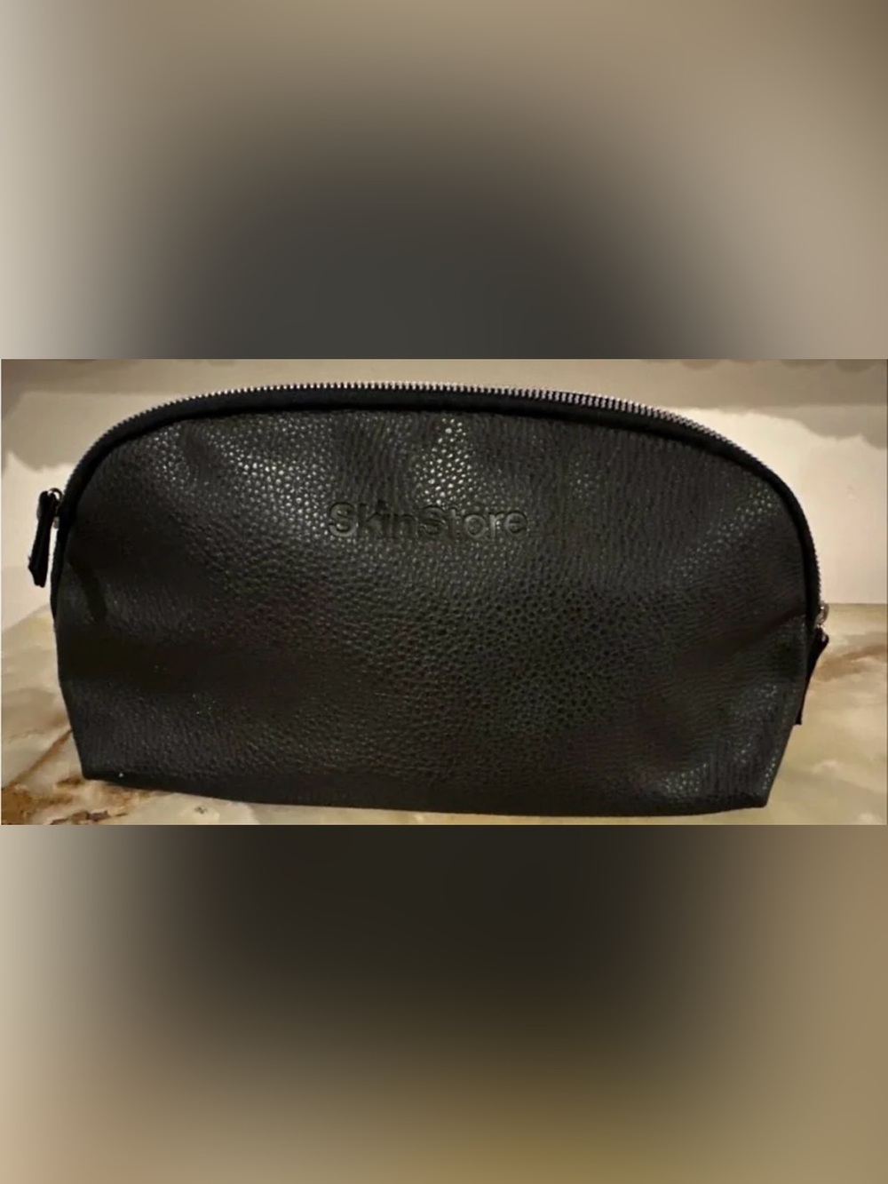 Skinstore pebbled vegan leather travel toiletry bag. Approx 12x6x3 inches